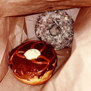 2024-03-21 0325 hours - Blueberry Streusel and Salted Caramel Cheesecake Doughnuts at Hurts Donuts