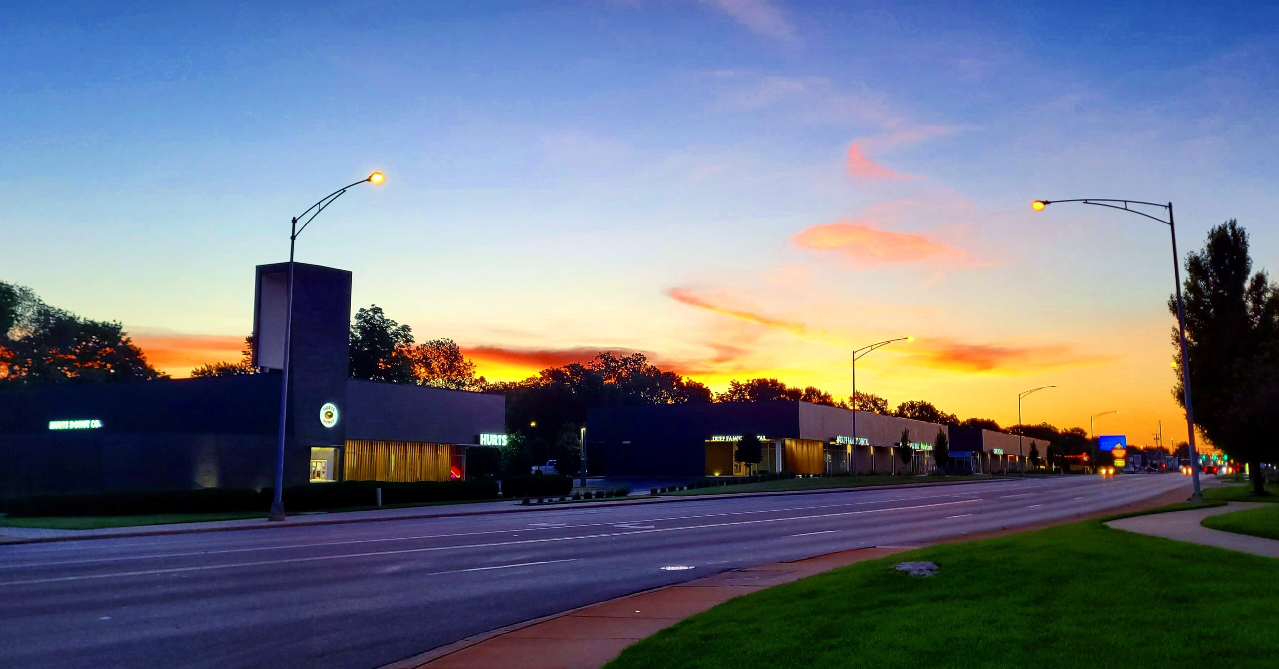 2024-06-11 0539 hours - Spectacular Colorful Sunrise over Hurts Donuts in Springfield