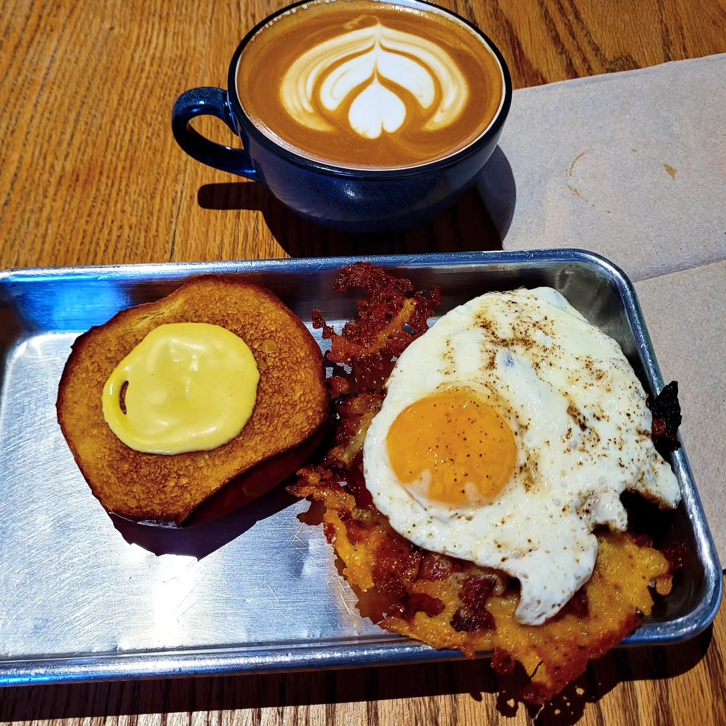 2025-07-12 1012 hours - Saturday Breakfast at Before & After Brewing - Bacon Egg & Cheese Sandwich with Cinnamon Latté