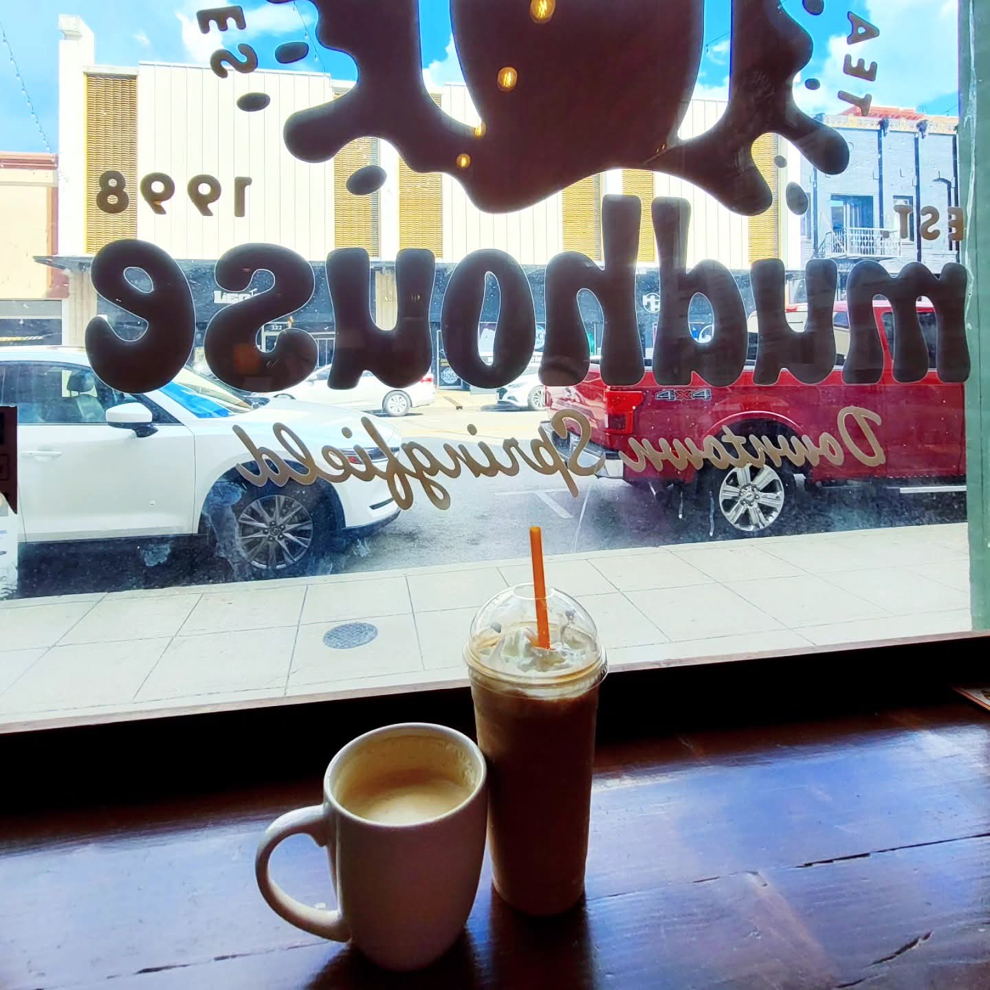 2025-09-16 1536 hours - Brady's Pumpkin Spice Latte and Haley's Elvis Frappuccino at Mudhouse in Downtown Springfield