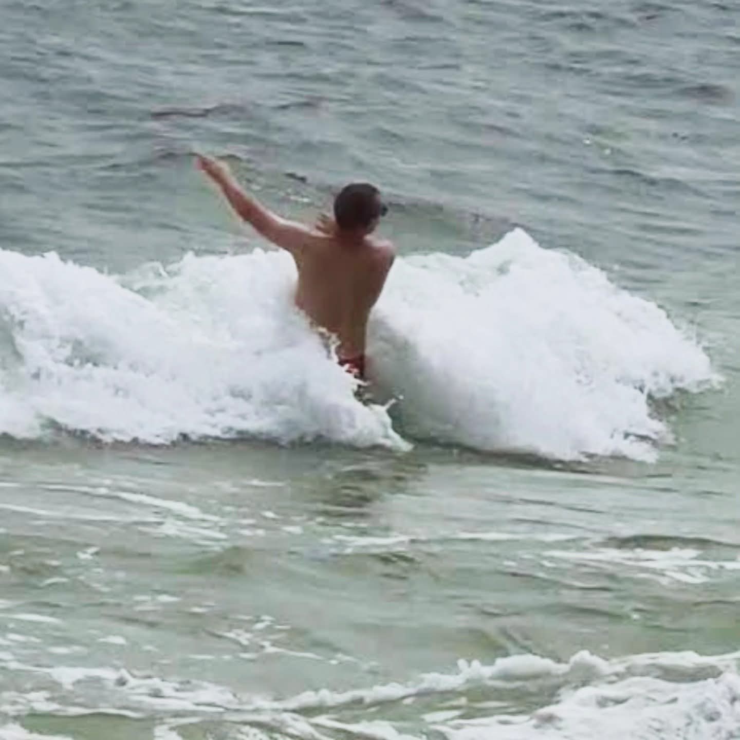 2025-09-22 1400 hours - Shirtless Brady Enjoying the Crashing Waves in Orange Beach