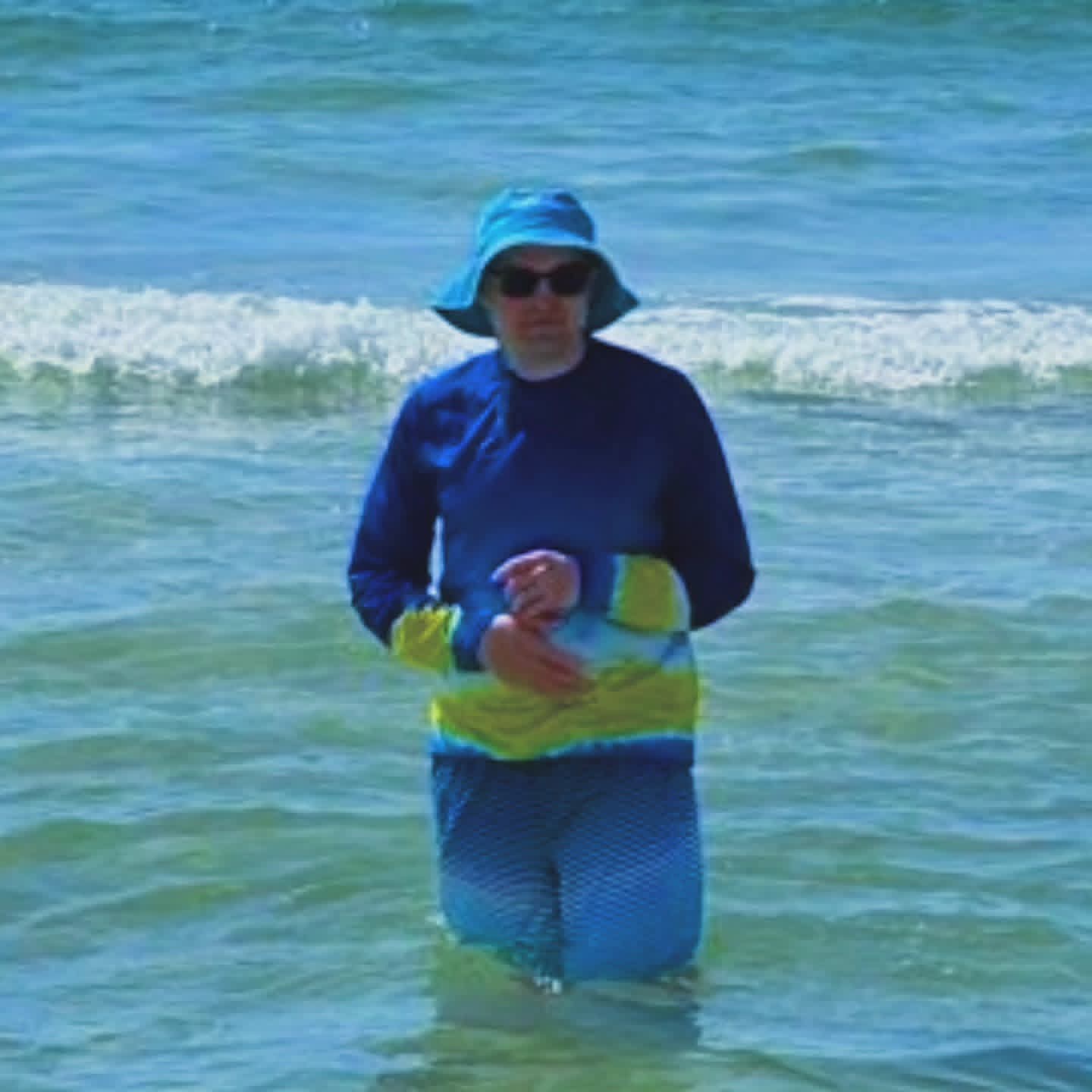 2025-09-24 1031 hours - Brady at the Beach in Orange Beach, Now Wearing Newly Bought Souvenir Hat & Sunproof Shirt