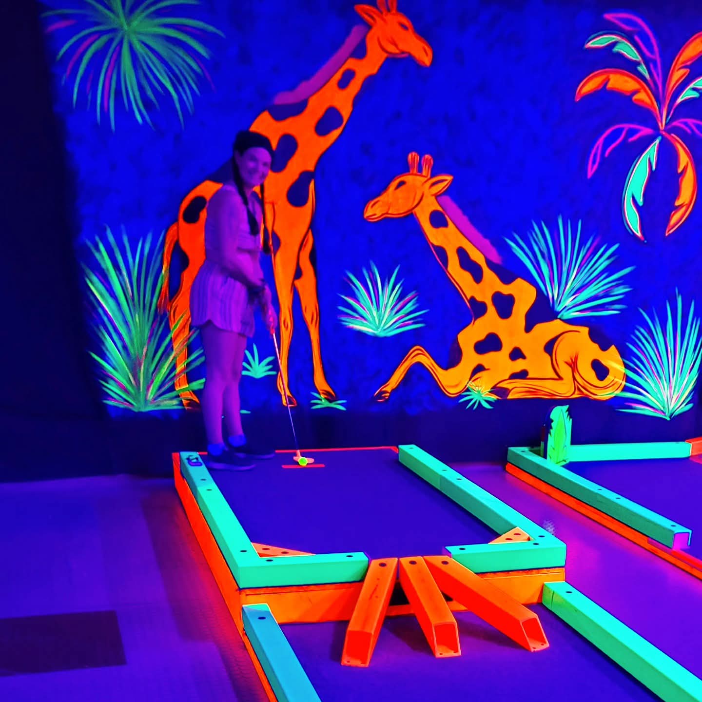 2025-09-30 1622 hours - Haley at the 'Divergent' Hole at Glow Golf