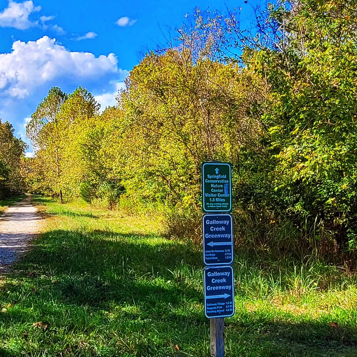 2025-10-06 1519 hours - Signs pointing to Springfield Nature Center and Galloway Creek Greenway Trail