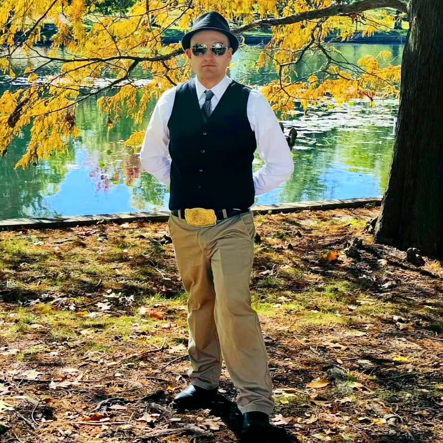 2025-10-31 1252 hours - Cool Cat Brady, Hands Behind his Back, at Schaible Lake Park on Halloween MMXXV