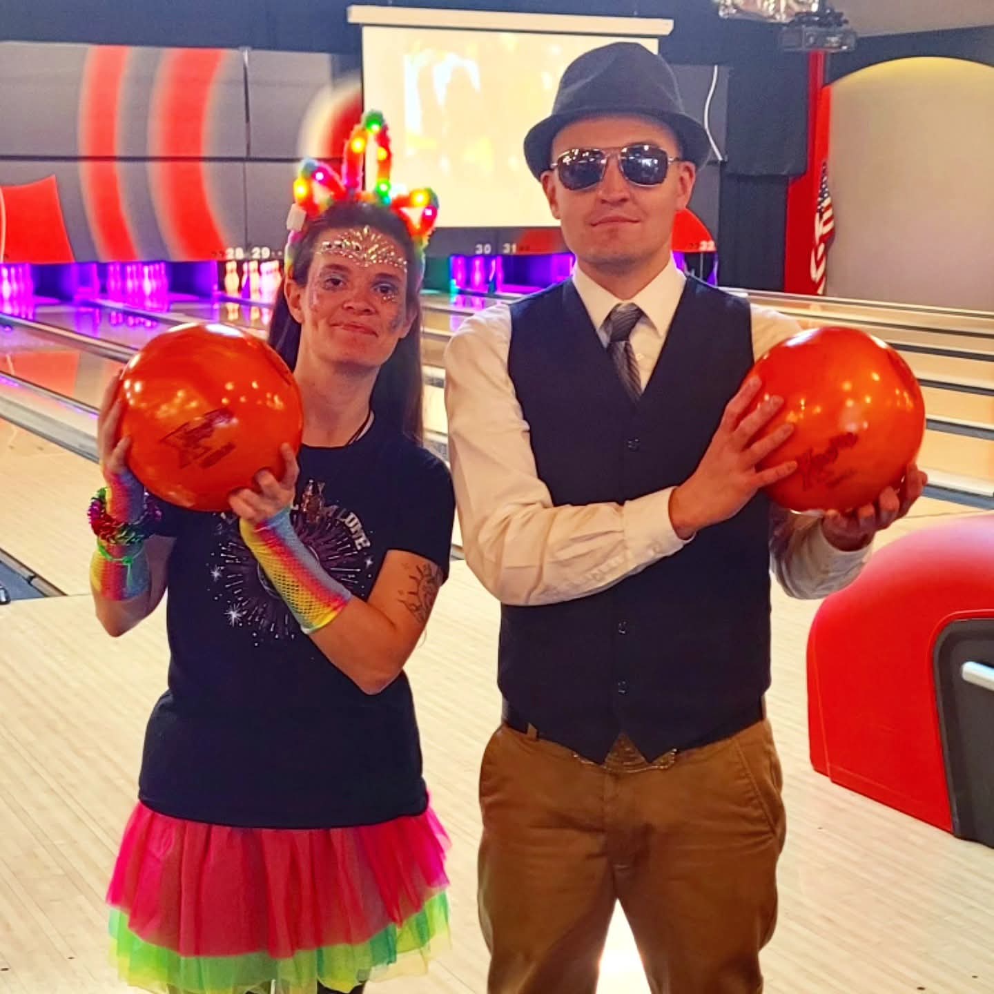 2025-10-31 1614 hours - Autism Buddies Rainbow Unicorn Haley & Cool Cat Brady Bowling at Andy B's on Halloween MMXXV