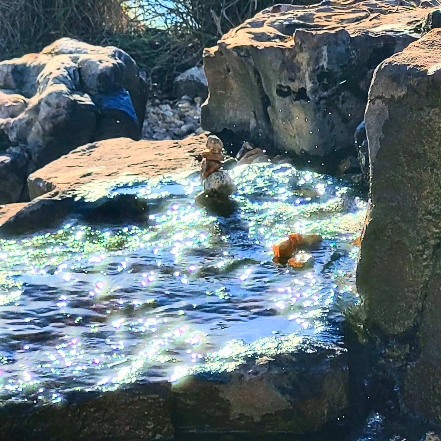 2025-11-03 1514 hours - Small Cairn on the Small Waterfall Fountain at Schaible Lake Park
