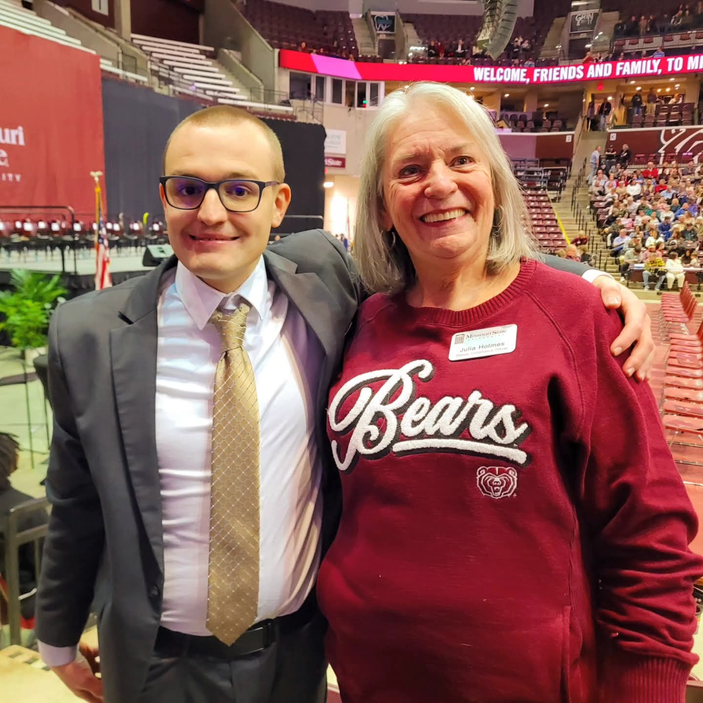 2025-12-12 1325 hours - Brady's Reunion with Julie Holmes from OTC's Disability Support Services, at Jacob Skaggs' Graduation